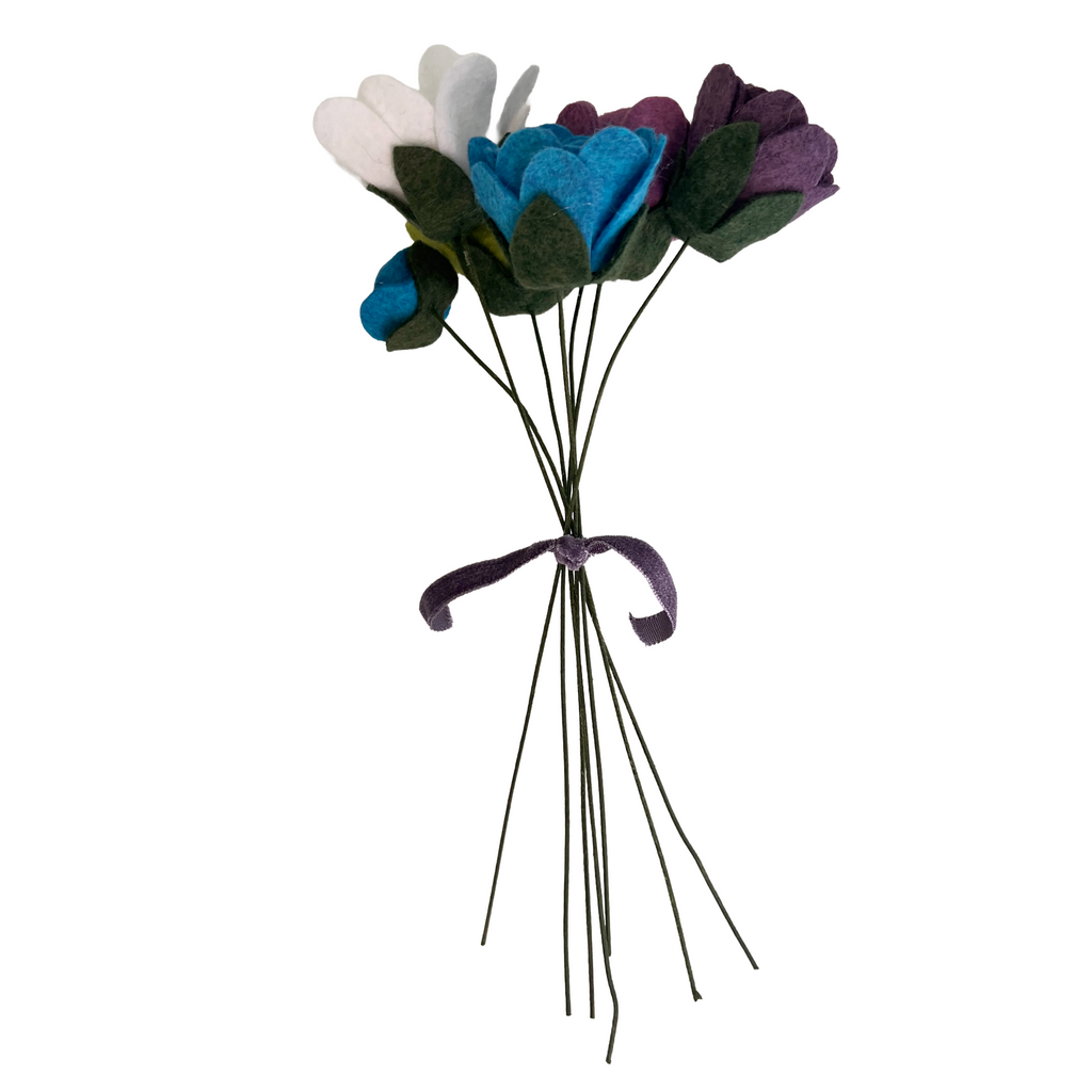 Bouquet of felt flowers on a white background