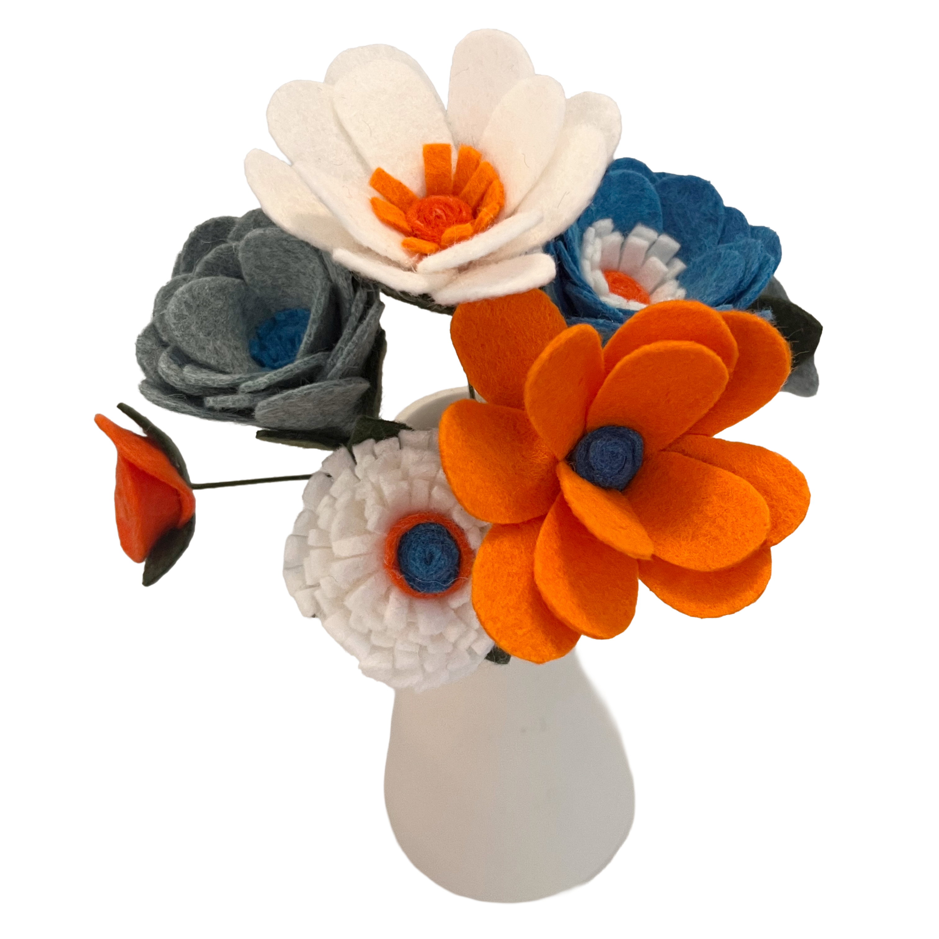 Felt flower arrangement with orange, blue, and white flowers on a white background
