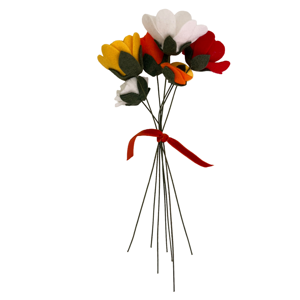 Bouquet of felt flowers on a white background