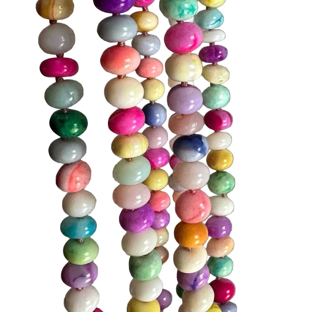 Colorful beaded necklace against a plain background