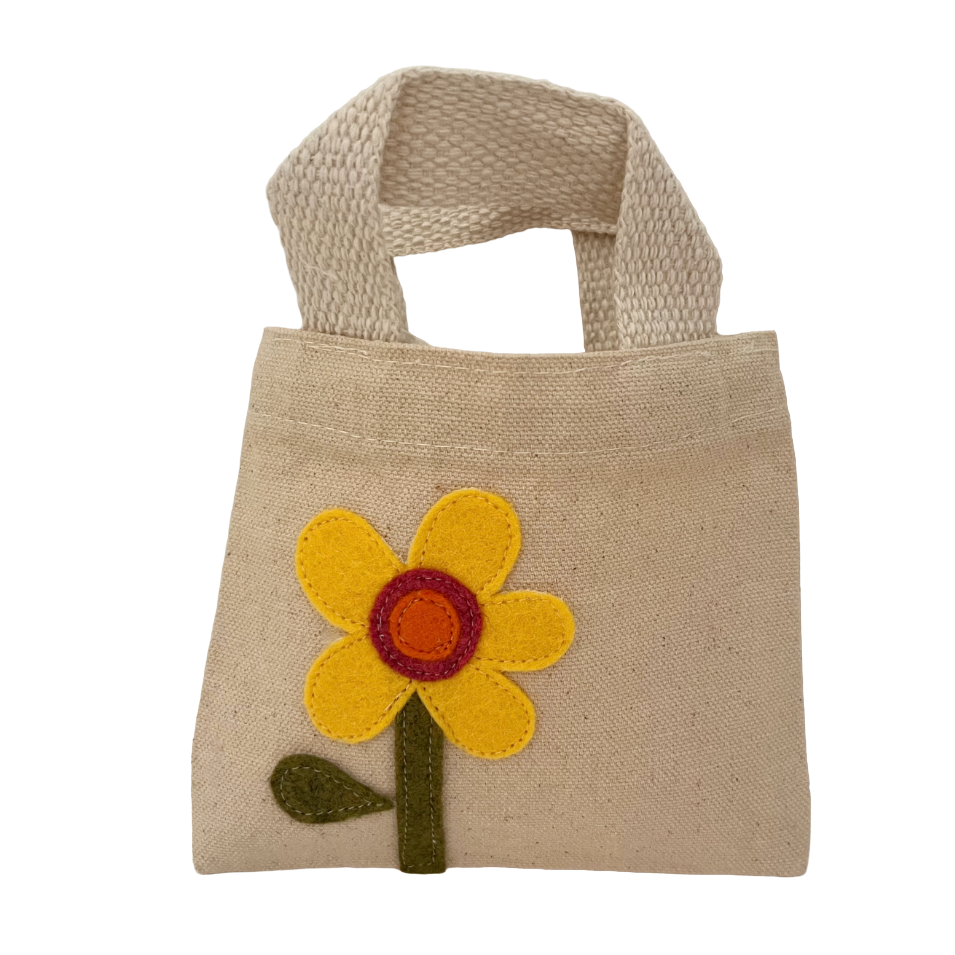 Beige fabric bag with a yellow flower design on a white background