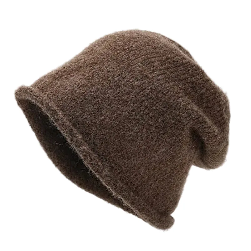 Brown knit beanie on a white background