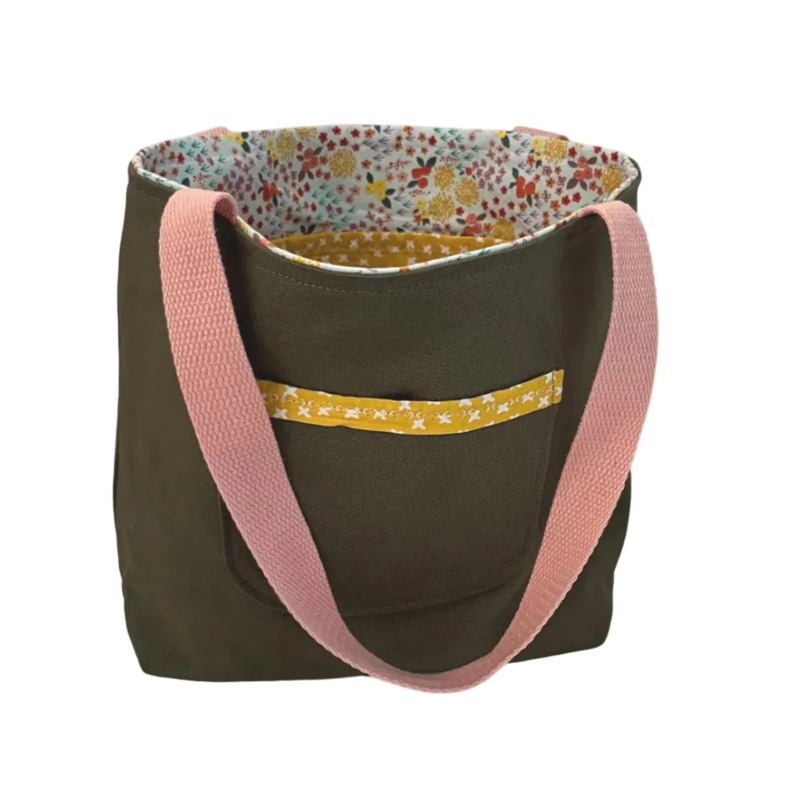 Green  tote bag with pink handles and floral lining on a white background