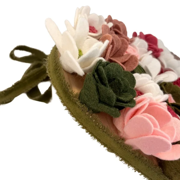 Floral with green ribbon on a white background
