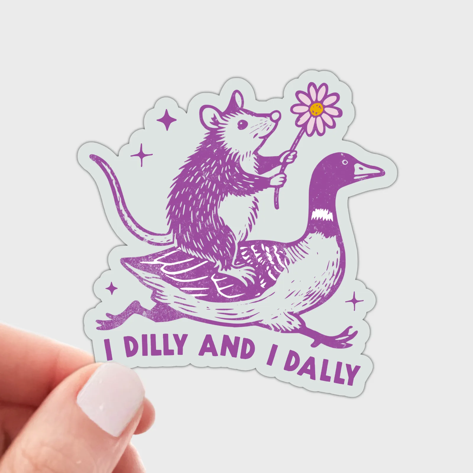 Sticker with a purple rat riding a goose holding a flower, text 'I Dilly And I Dally' on a light gray background.
