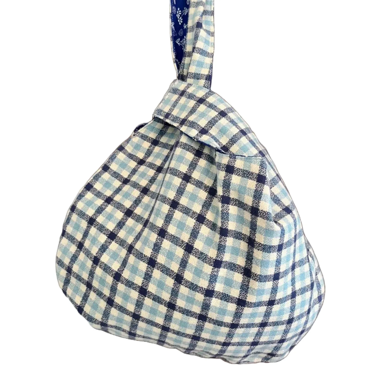 Blue and white checkered bag on a white background
