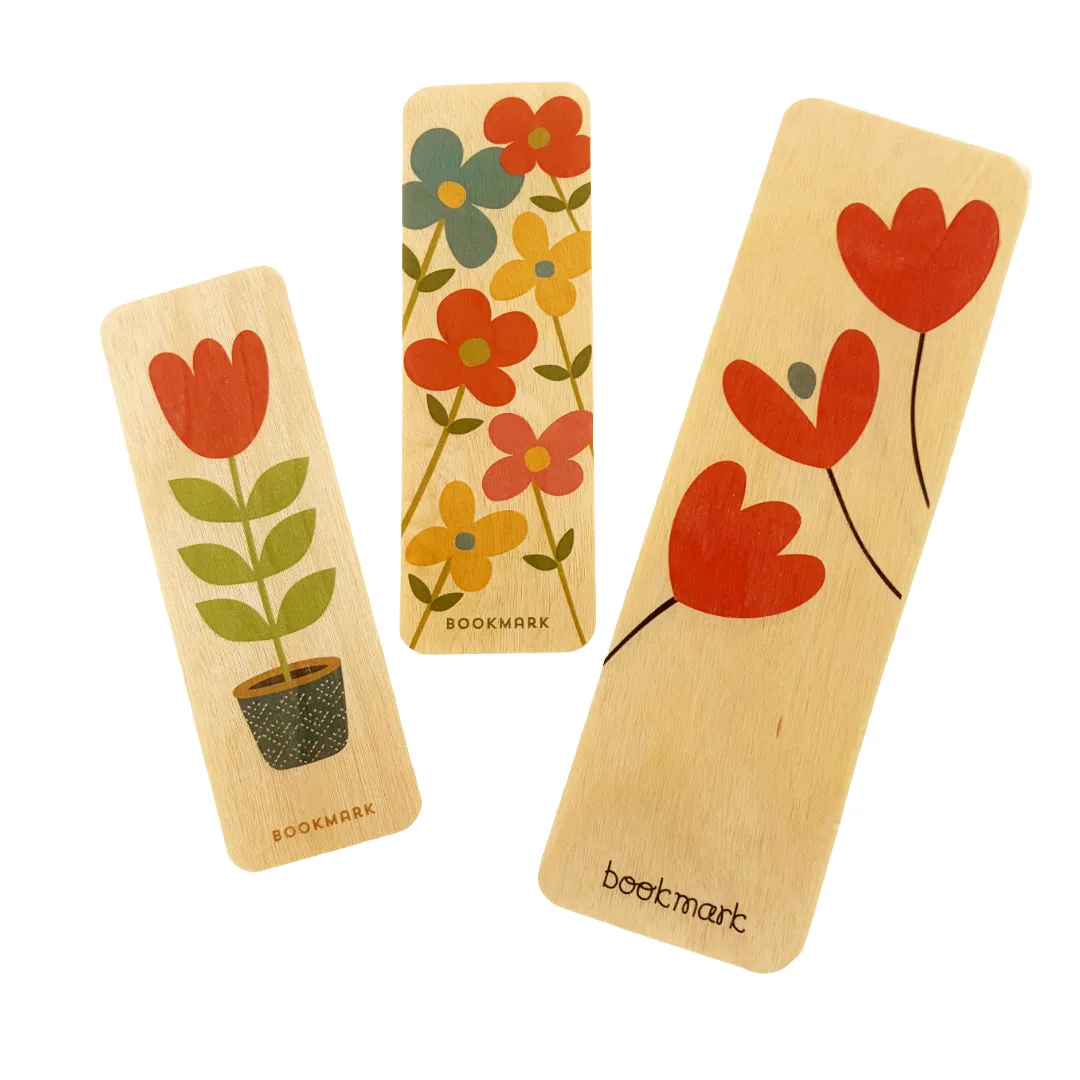 Three wooden bookmarks with colorful painted floral designs, displayed on a clean white background. The brand name 'beetmart' is printed on two of the bookmarks.