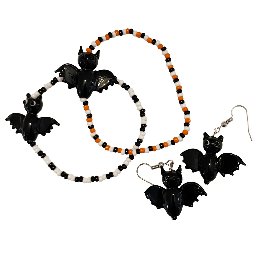 Handmade beaded bat bracelets and earrings in black, orange and white
